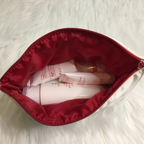 Clarins Paris | Lotions & Makeup Bag Set - Picture 4 of 12